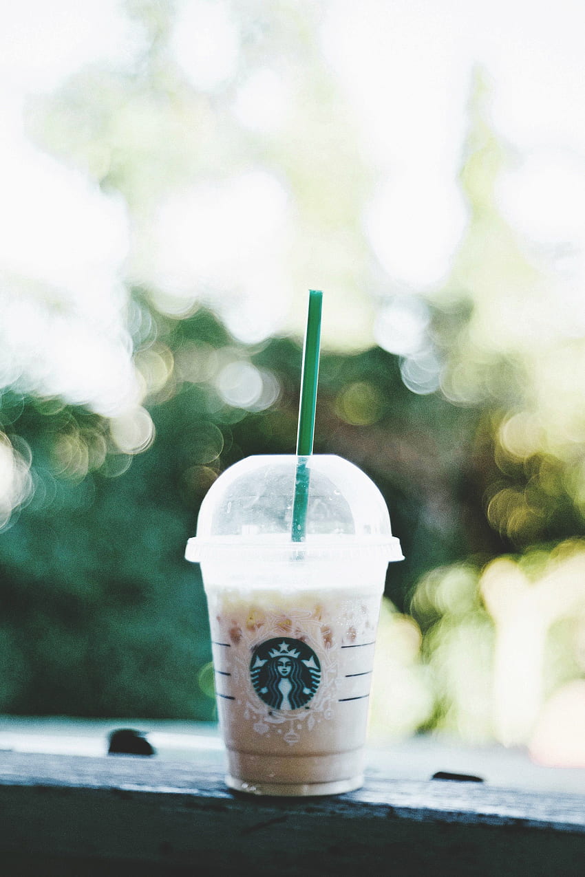 / iced starbucks coffee frappuccino with cream on a patio ledge, coffee HD phone wallpaper