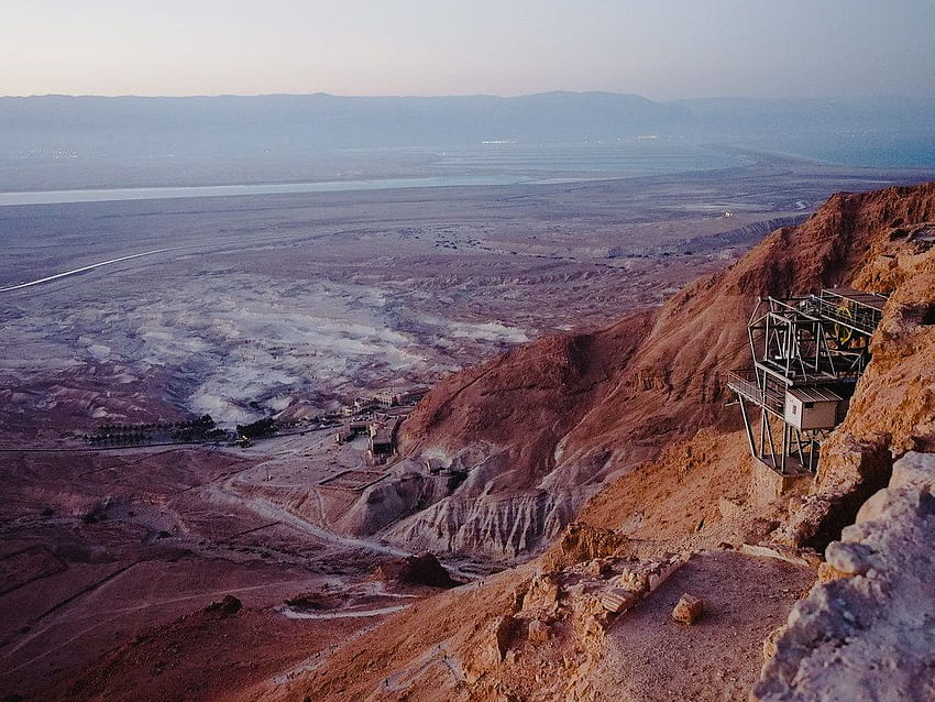 Masada is the name for a site of ancient palaces and fortifications in the  South District of Israel, on top of an isolated rock plateau, or horst, on  the eastern edge of