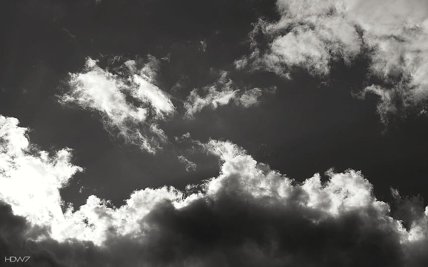 clouds covering the sun in black and white . HD wallpaper