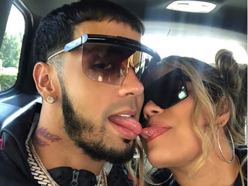 WATCH Anuel AA Covering Up Massive Back Tattoo of Him  Karol G