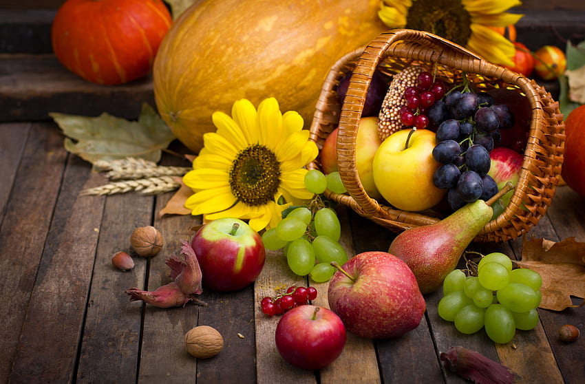 Herbst-Hintergrund mit Kürbis und Obstkorb HD-Hintergrundbild