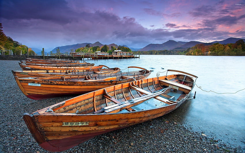 Wooden boats on the pebble beach of the river HD wallpaper