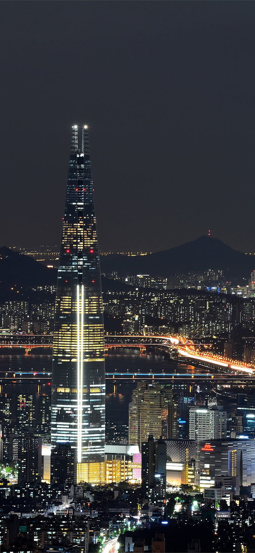 Lotte World Tower ve Seoul So'nun gece ışıkları. iPhone HD telefon duvar kağıdı