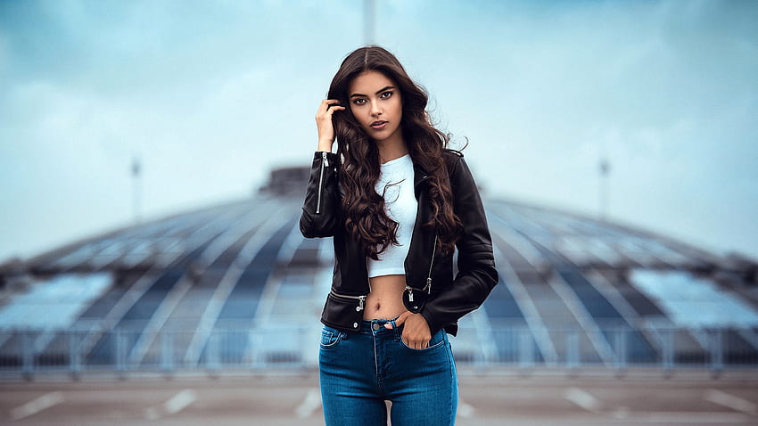 Beautiful Girl Model Laura Theresa Is Wearing White Top Black Leather Jacket And Blue Jeans Standing In Blur Background Girls HD wallpaper
