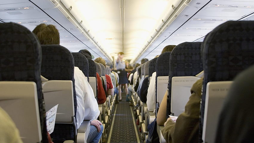 Il coronavirus non si diffonde più velocemente all'interno degli aeroplani, cabina dell'aeroplano Sfondo HD