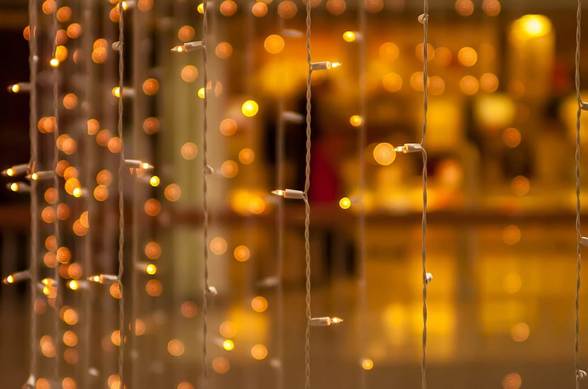 primer plano guirnalda bombillas bokeh amarillo desenfoque bokeh decoración panorámico completa wid. Luces navideñas, Luces de lluvia, Tiras de luces fondo de pantalla