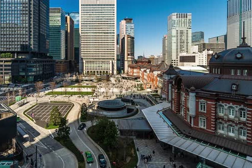 time lapse of Tokyo station, a railway station in the Marunouchi business district in Tokyo, Japan by geargodz on Envato Elements HD wallpaper