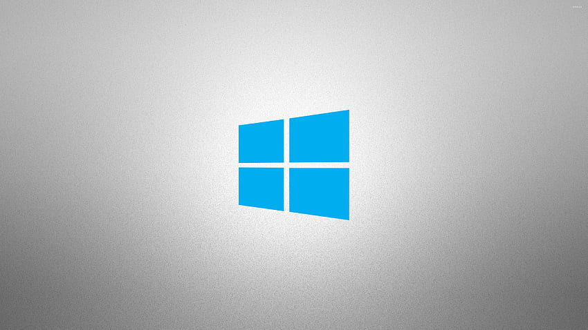 粒子の粗いグレーに Windows 10 のシンプルな青いロゴ 高画質の壁紙
