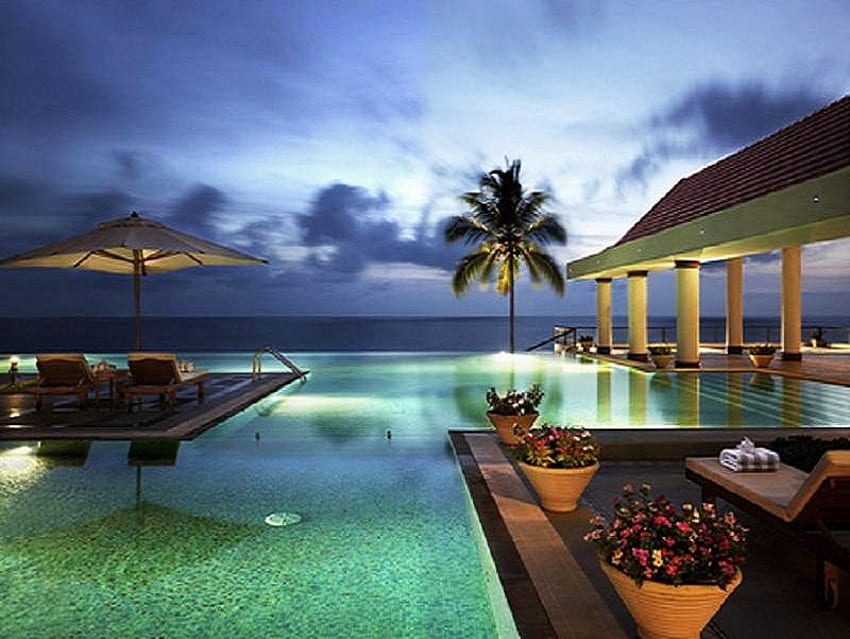 What a lovely way to spend an evening, lounge, umbrellas, plants, deck chairs, swimming pool, palm trees, ocean HD wallpaper