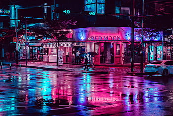 Detail of wet city street on rainy night. Traffic passing by. Good ...