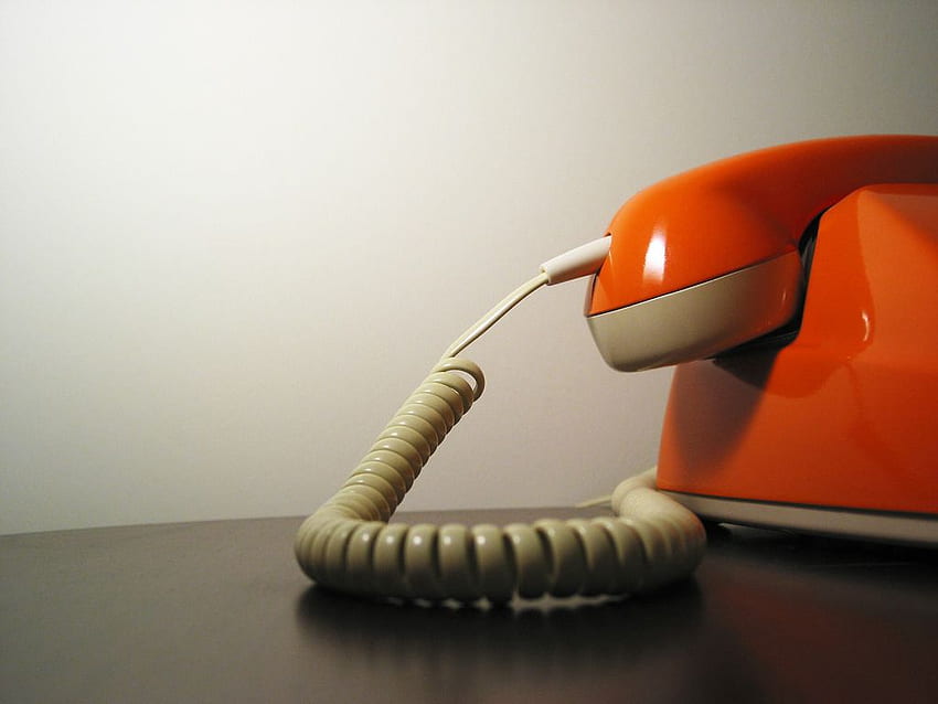 Hotline. Vintage telephone (orange, of course) in the Veer HD wallpaper