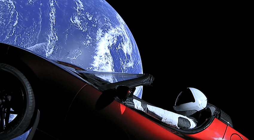 Guarda lo spazio in orbita di Tesla rosso pazzo di Elon Musk Sfondo HD