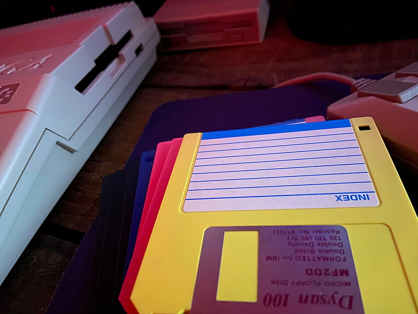 Servizio di scrittura / copia su floppy disk Amiga ( - giochi - applicazioni) Sfondo HD