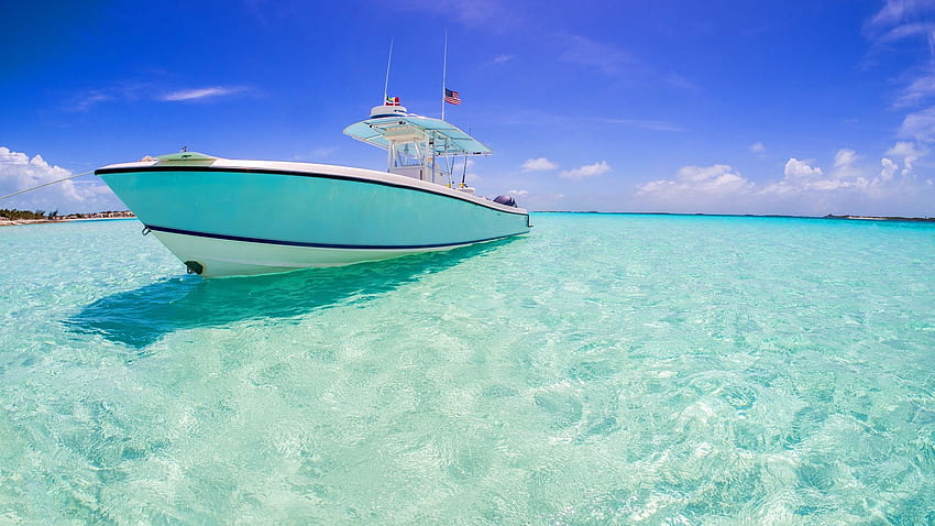 Schnellboot im türkisfarbenen Ozean. Hintergrund HD-Hintergrundbild