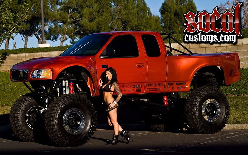 jacked up trucks red