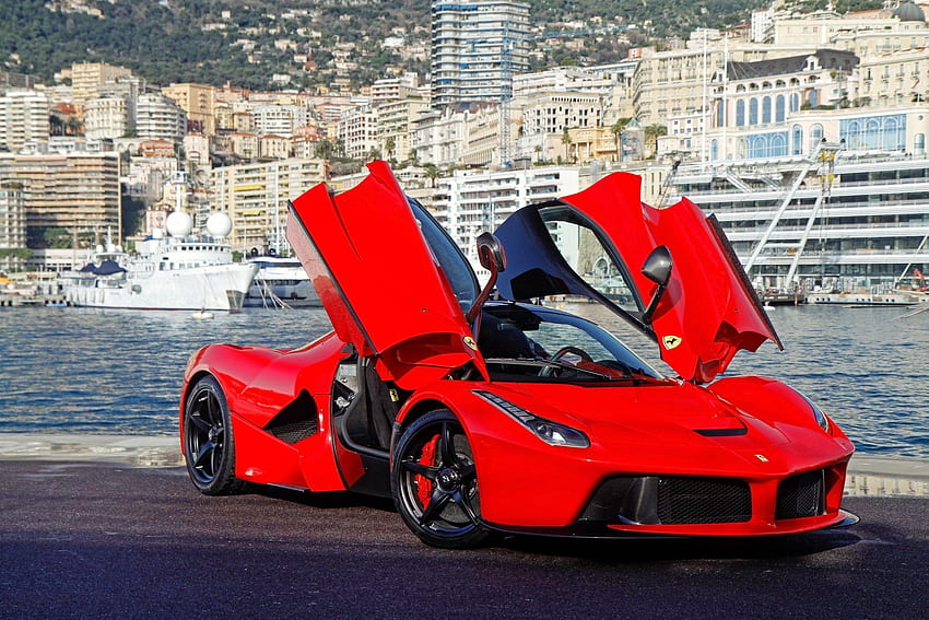 Ferrari LaFerrari HD Wallpaper - hình nền độc đáo và đẹp mắt về siêu xe Ferrari LaFerrari sẽ làm cho bạn say mê và muốn tìm hiểu thêm về thiết kế và công nghệ tiên tiến của chiếc xe này. Với hình ảnh chất lượng cao, bạn có thể nhìn thấy rõ và cảm nhận tất cả những chi tiết hoàn hảo và đầy mê hoặc của LaFerrari.