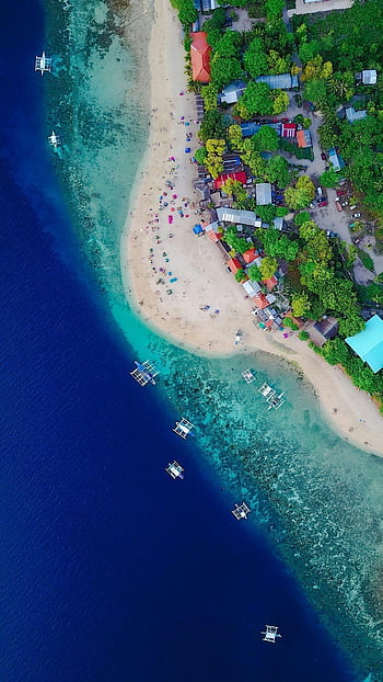 Aerial drone bird's eye view of man exercising sup paddle board in ...