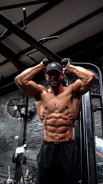 Gym goer trains triceps using a rope for a powerful upper body AI Generated  29294728 Stock Photo at Vecteezy