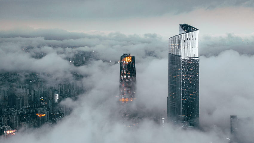 Clouds cover buildings, city HD wallpaper