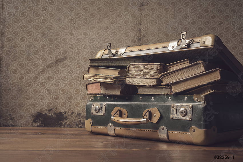 Vintage suitcase full of old books HD wallpaper