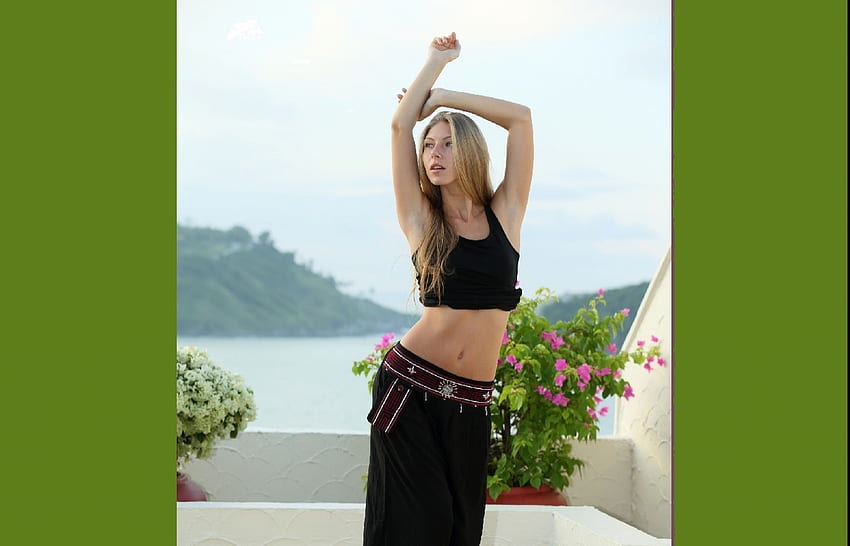 Anjelica Ebbi, black top and long skirt, blonde, headland, flowers, balcony, belt, lake, belly dancing HD wallpaper