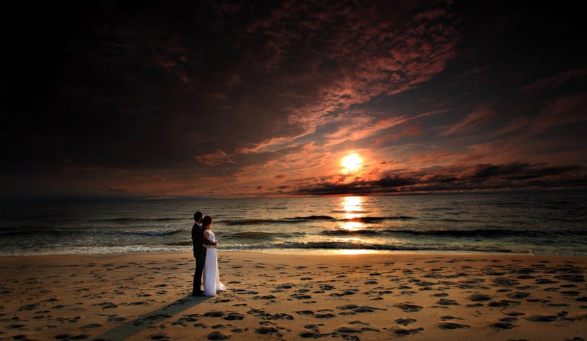 Watching The Sunset, sand, sunlight, colors, peaceful, beauty, beach, lady, waves, reflection, ocean, female, sunset, sea, man, girl, beautiful, ocean waves, woman, wedding, hug, love, clouds, nature, sky, lovely, splendor, bride HD wallpaper