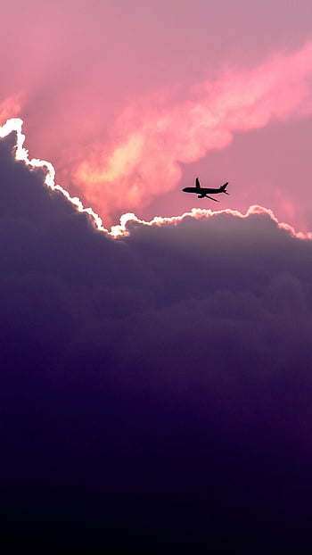 Sunset View From the Window of an Airplane iPhone Wallpapers Free Download