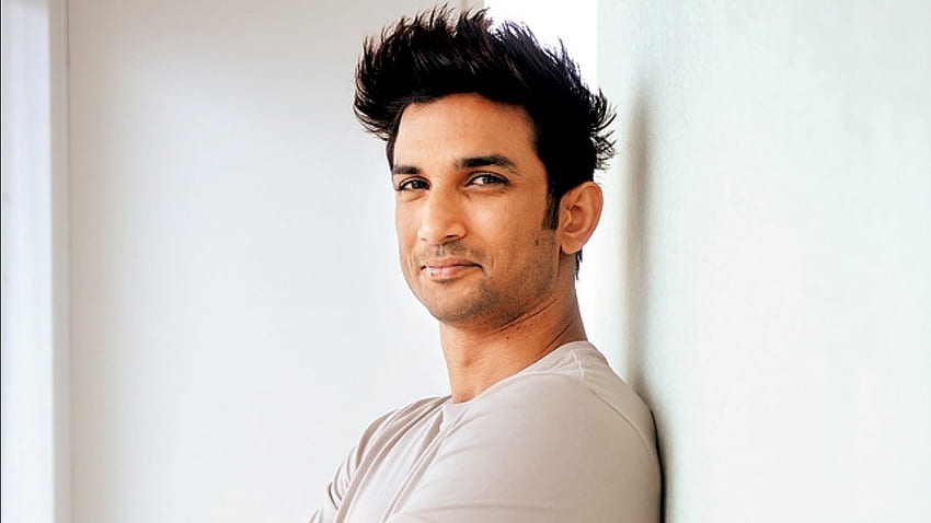 Sushant Is Leaning Back On White Wall Wearing White Dress Sushant Singh Rajput HD wallpaper