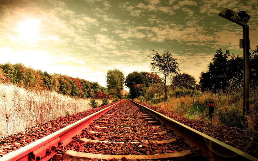 railroad tracks in a bright autumn day, clouds, trees, autumn, tracks, sun, railroad HD wallpaper