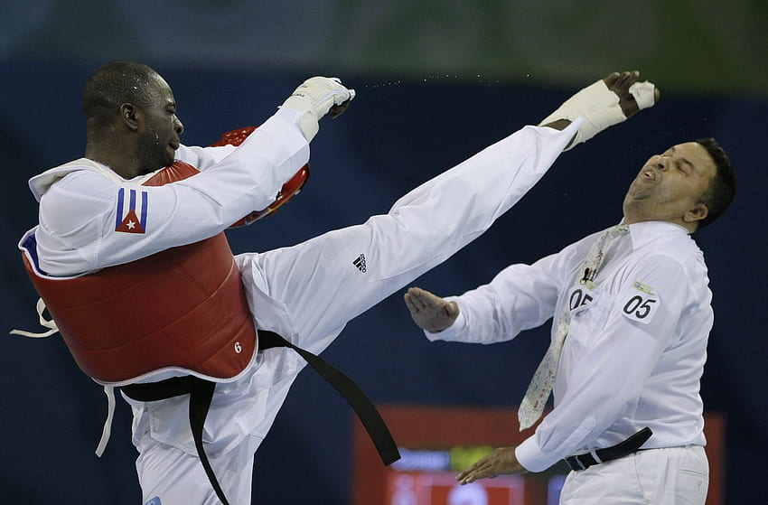 Olympics taekwondo martial arts kicking sport suit People , Hi Res
