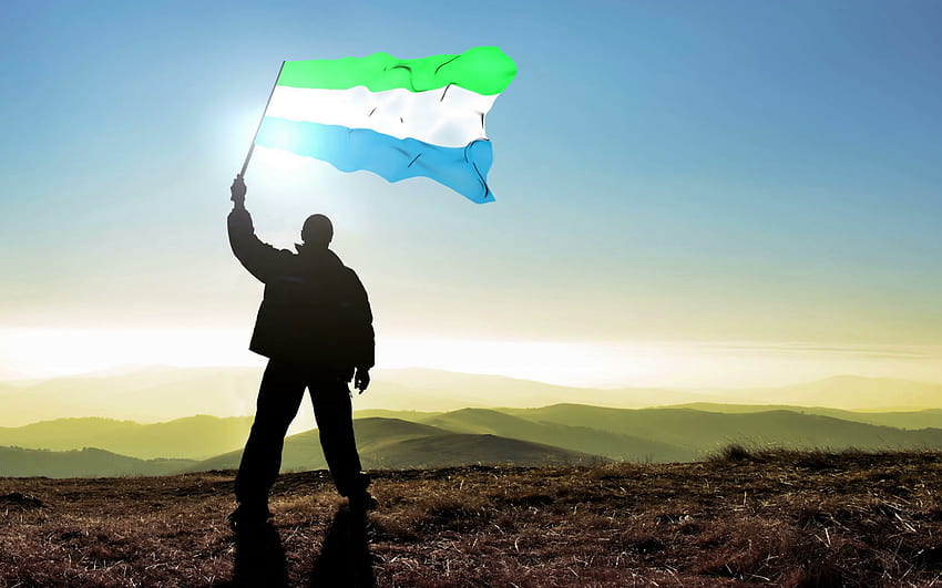 Successful silhouette man winner waving Sierra Leone flag on Stock [] for your , Mobile & Tablet. Explore Sierra Leone Flag . Sierra Leone Flag , Sony HD wallpaper