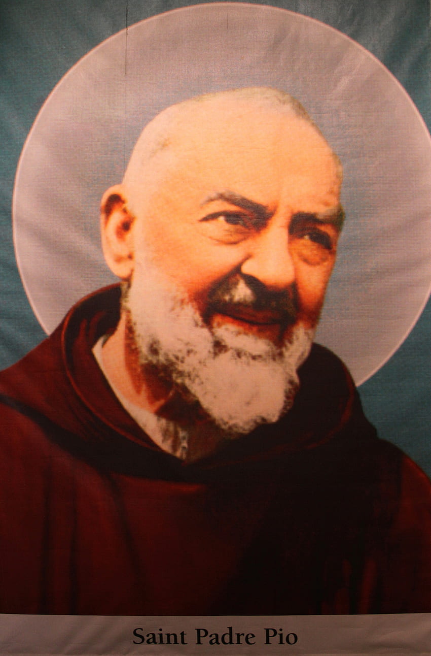 of saint Padre Pio. All Christians in heaven are considered to be saints HD phone wallpaper