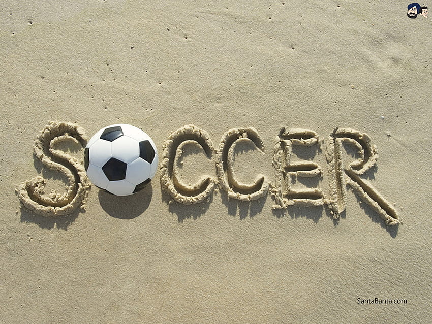 Soccer ball on beach HD wallpaper