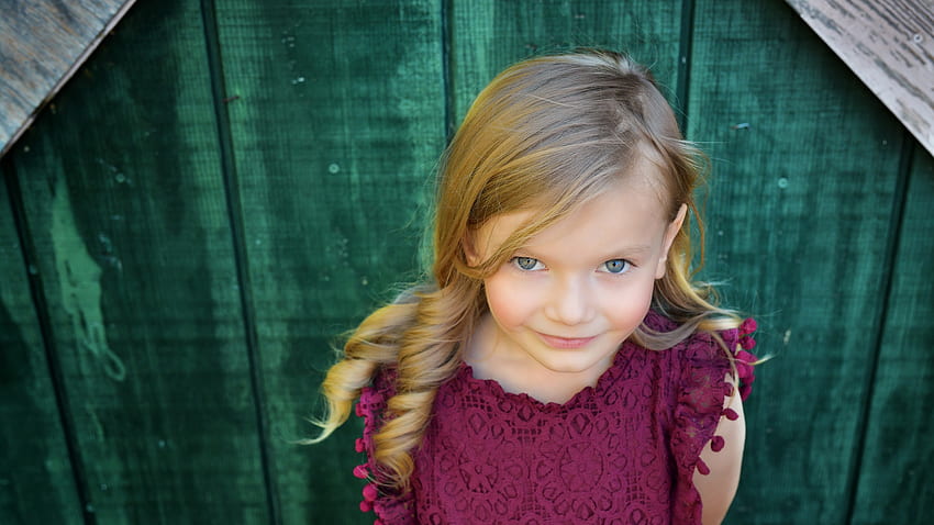 Grey Eyes Cute Little Girl Is Standing In Green Wood Door Background Wearing Maroon Dress Cute HD wallpaper