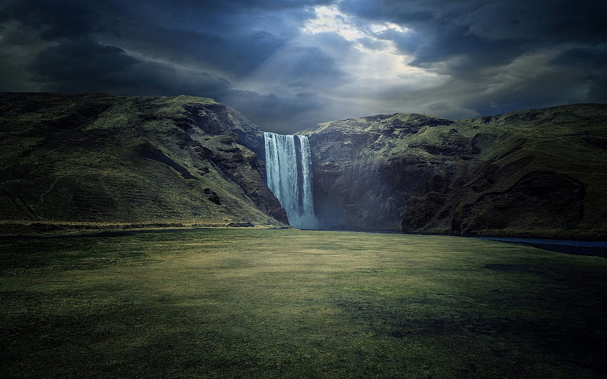 wodospad przyrodzie rzeka pejzaż słońcem promienie urwisko ciemnymi obłoki sunlight islandia and backgrou. Wodospad, kraj wodospadu, wodospad Skogafoss, las Islandii Tapeta HD
