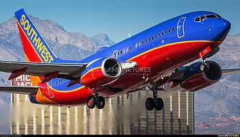 Southwest Airliner That Sits On The Runway On A Stormy Night Background  Southwest Airplane Pictures Background Image And Wallpaper for Free Download