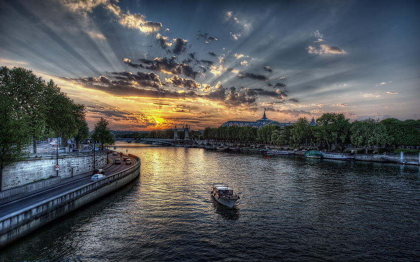 Sunset In Paris, rays, river, boat, colorful, sunlight, cars, colors, peaceful, beauty, buildings, reflection, boats, trees, road, water, sunset, architecture, city, paris, beautiful, france, building, view, bridge, clouds, nature, sky, lovely, evening HD wallpaper