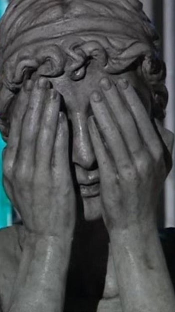 Weeping Angel Covering Face