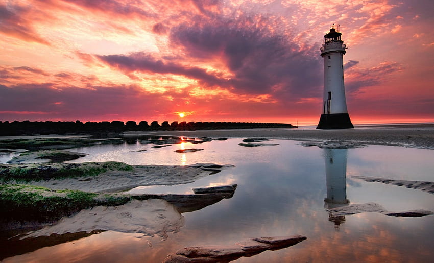 wonderful lighthouse at sunset, lighthouse, tidal pools, clouds, sunset, beach HD wallpaper