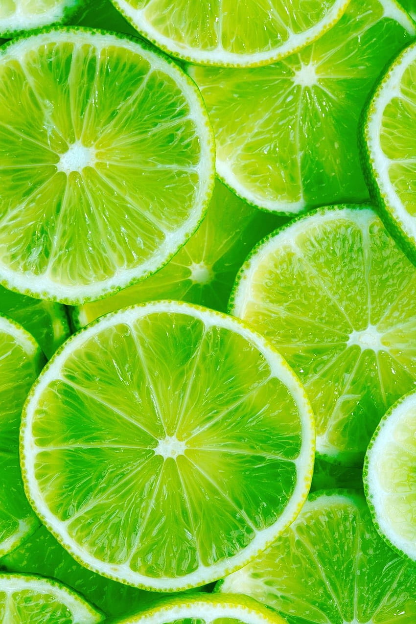 Mural de parede de fatias de limão: Comestíveis: frutas: essas fatias de limão vibrantes adicionarão um toque de cor ou destaque a qualquer um. Estética Verde, Verde, Frutas, Verde Limão Papel de parede de celular HD