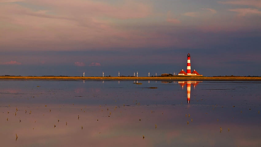 wonderful lighthouse among turbine windmills, sea, shore, lighthouse, reflection, windmills HD wallpaper