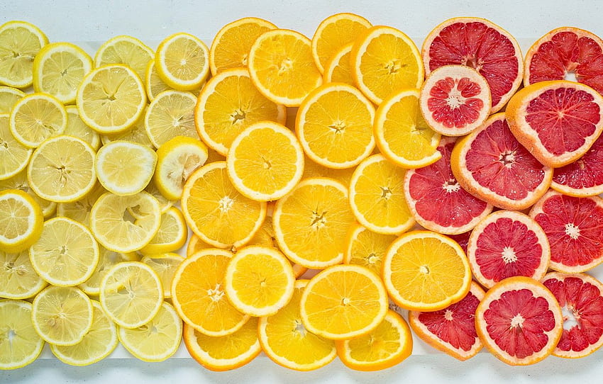 シトラス、グレープフルーツ、レモン、オレンジ、ジューシーなスライス 高画質の壁紙