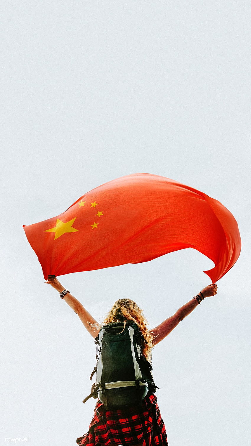 premium of Woman holding the Chinese flag mobile HD phone wallpaper