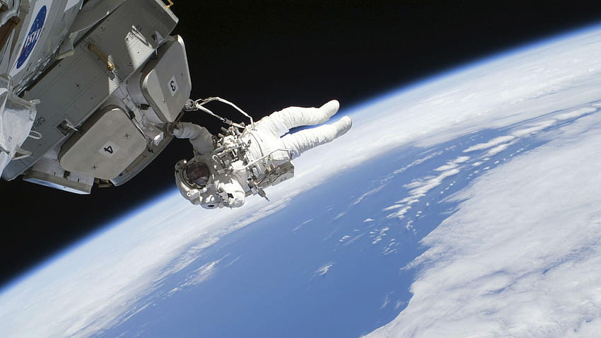 Sollten wir auf dem Mars leben? Der NASA-Astronaut Ron Garan glaubt, dass wir uns auf die Behebung von Problemen auf der Erde konzentrieren sollten, anstatt auf die Kolonisierung des Mars, die Kolonisierung des Weltraums HD-Hintergrundbild