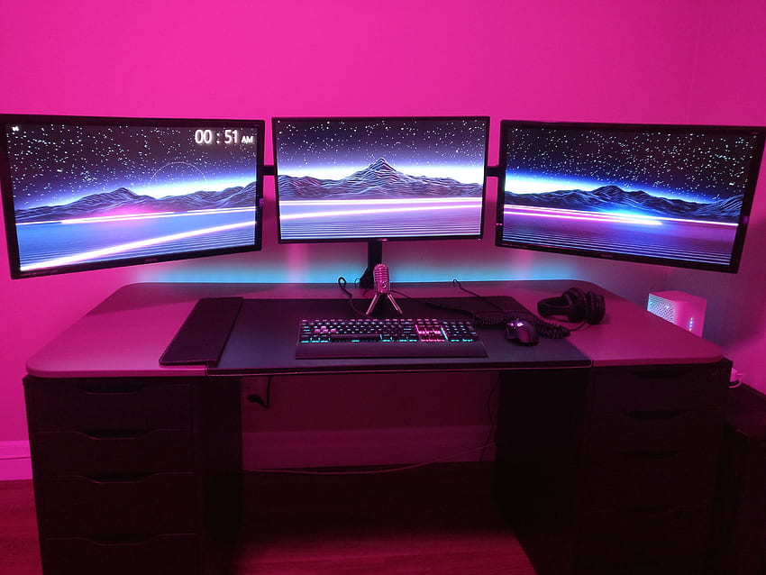 I know the vaporwave aesthetic is a bit overdone but I just built a triple  monitor