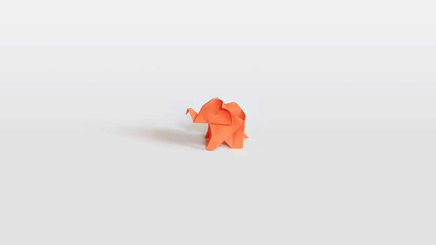 Origami-Elefant. Wie wäre es mit einem orangefarbenen, minimalistischen Elefanten? HD-Hintergrundbild