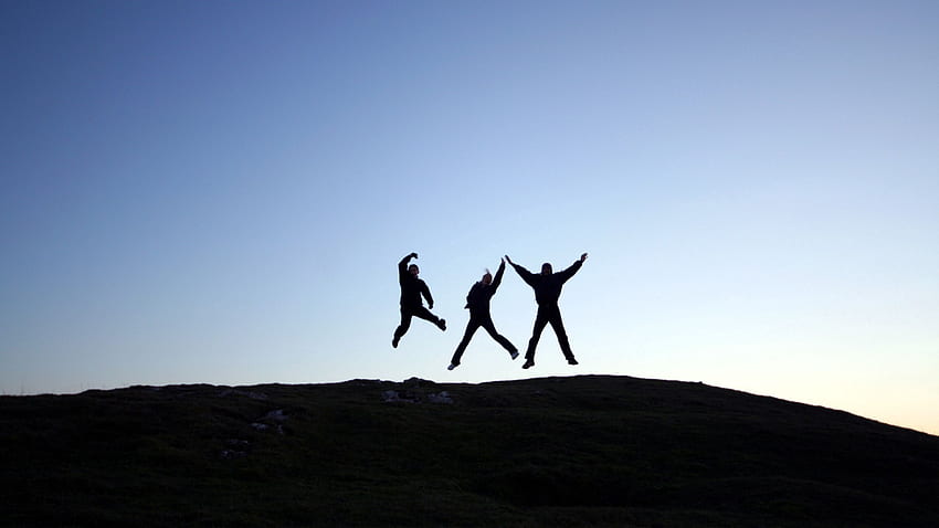 people, jump, hill, shadow, silhouette 16:9 background HD wallpaper