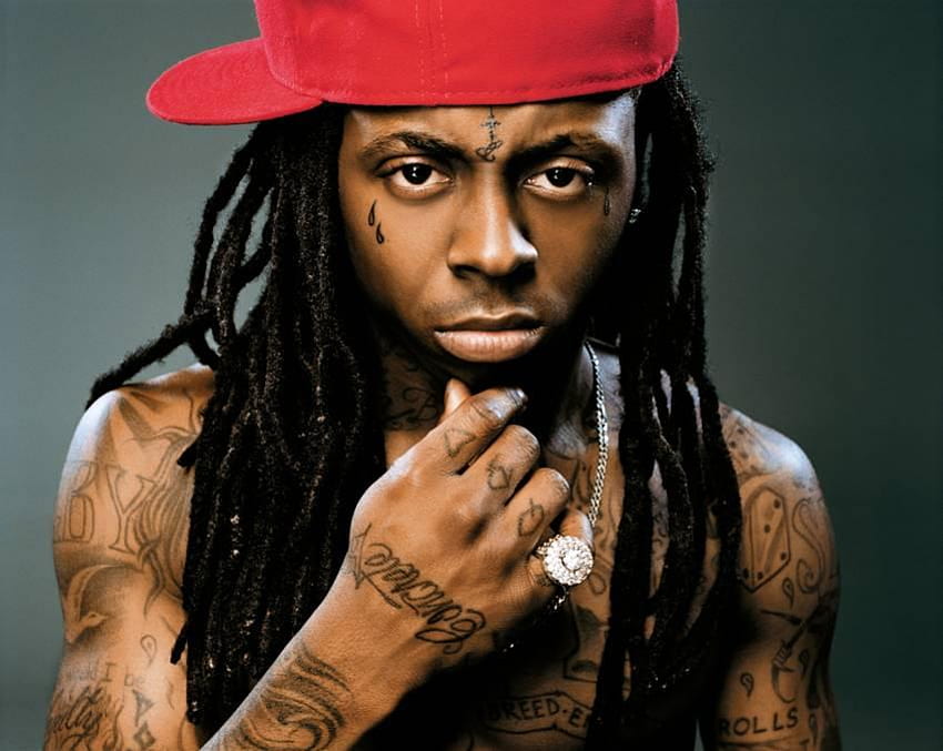 Photo Lil Wayne has Piru and Damu tatted on him in red and Cash  Money boldly on his chest  Peace FM Photos  Peacefmonlinecom
