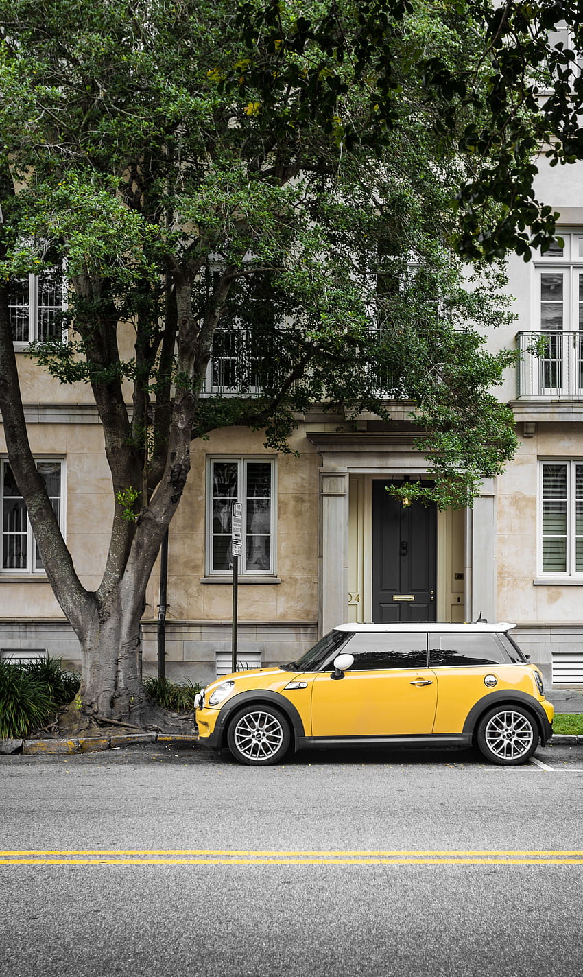 Yellow Mini Cooper Parked Beside White Concrete Building · HD phone wallpaper