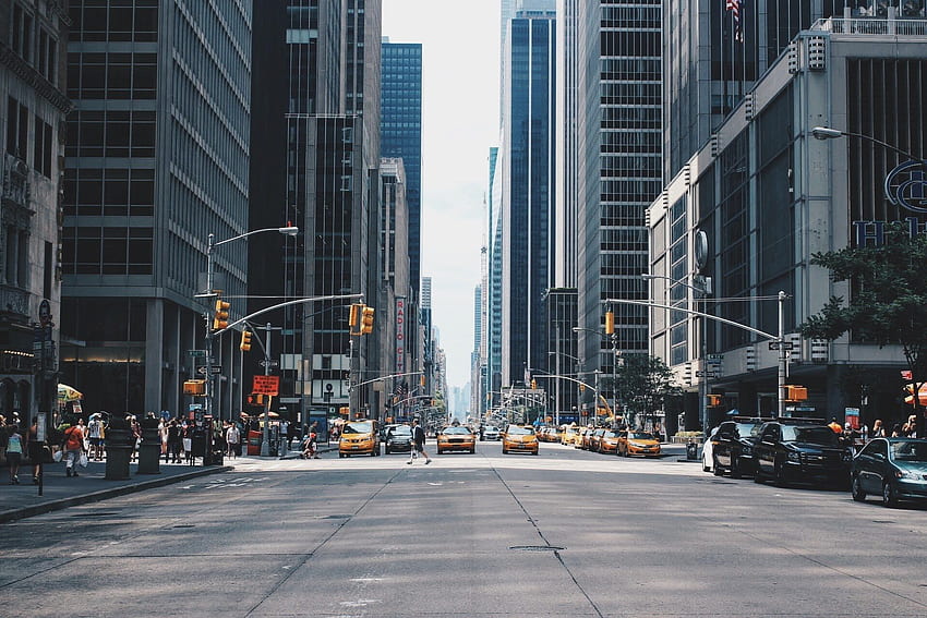 / view of a busy new york city street from the intersection, crossing the street HD wallpaper
